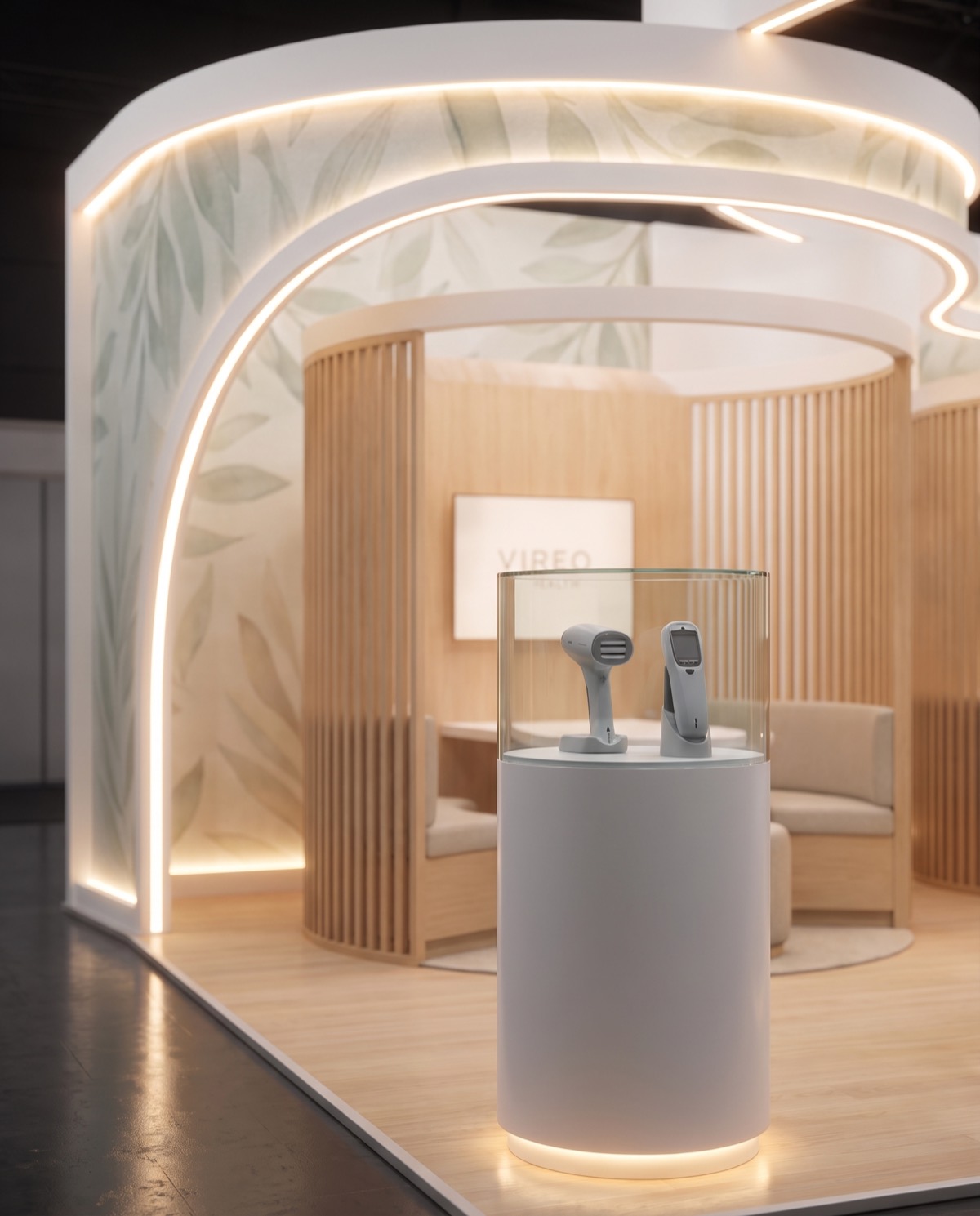 Close-up render of a handheld medical device under glass on a white plinth, with an oak-slat pod behind